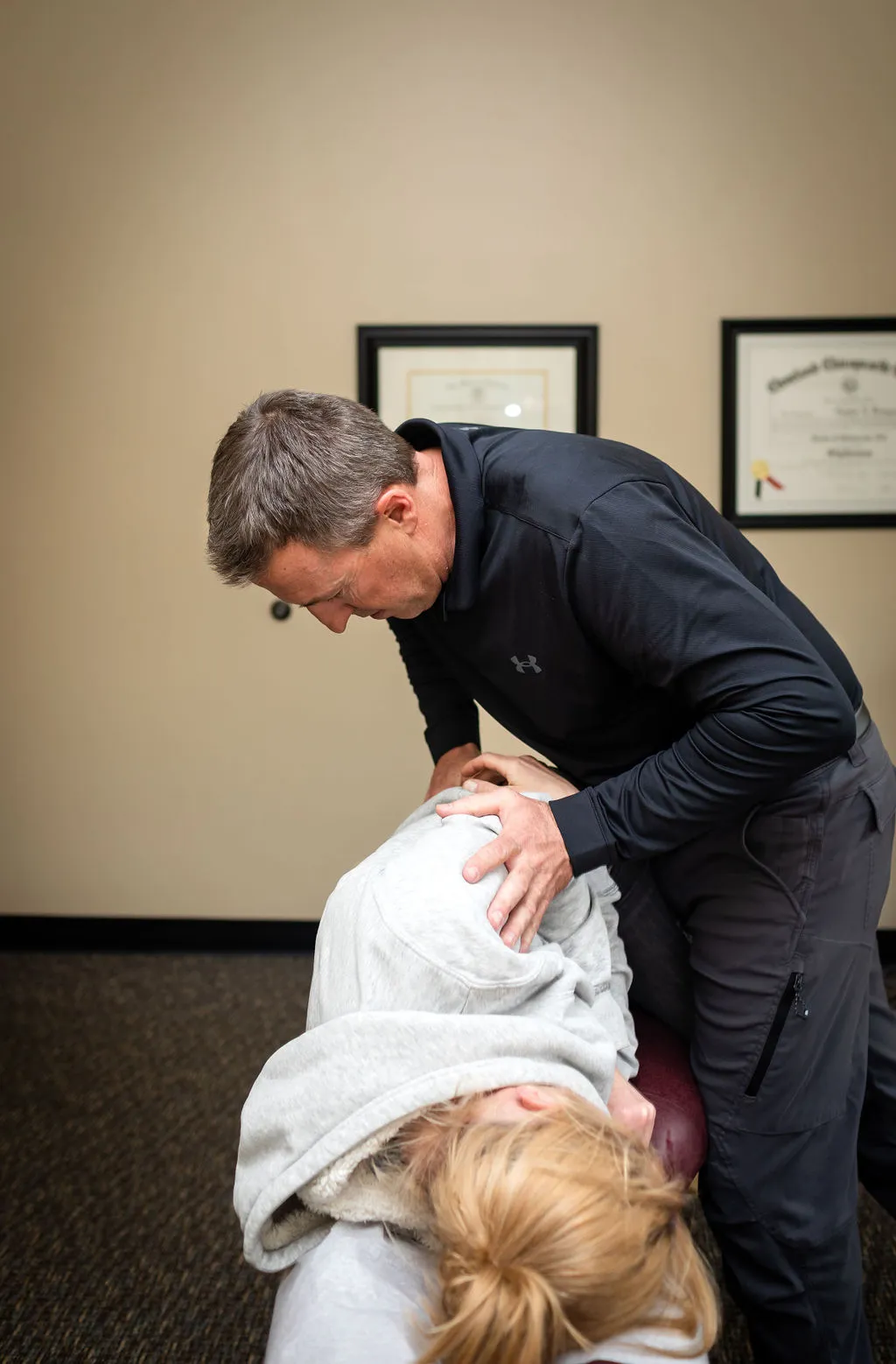 Dr. Dustin performing spinal alignment therapy