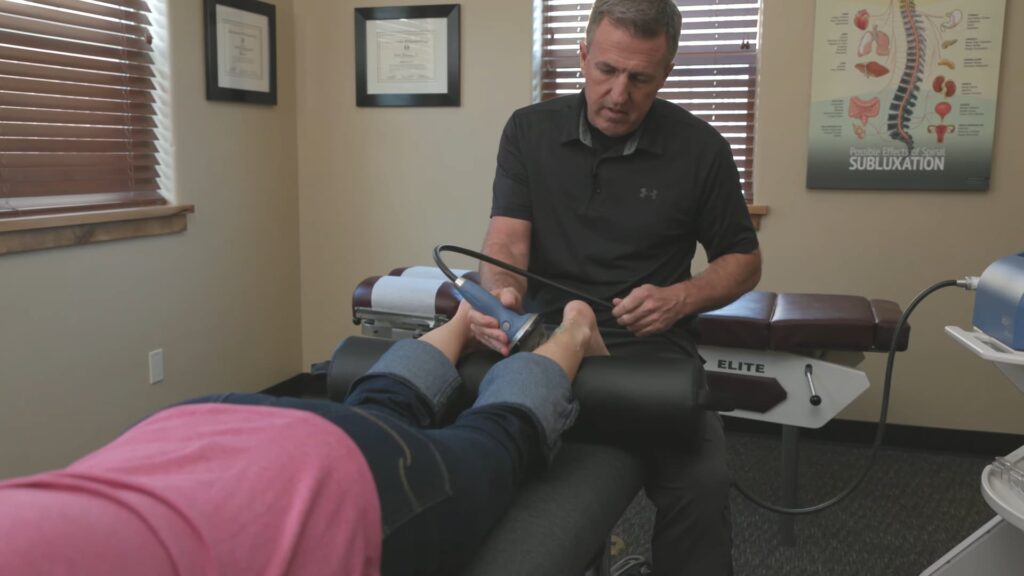 Chiropractic leg adjustment treatment