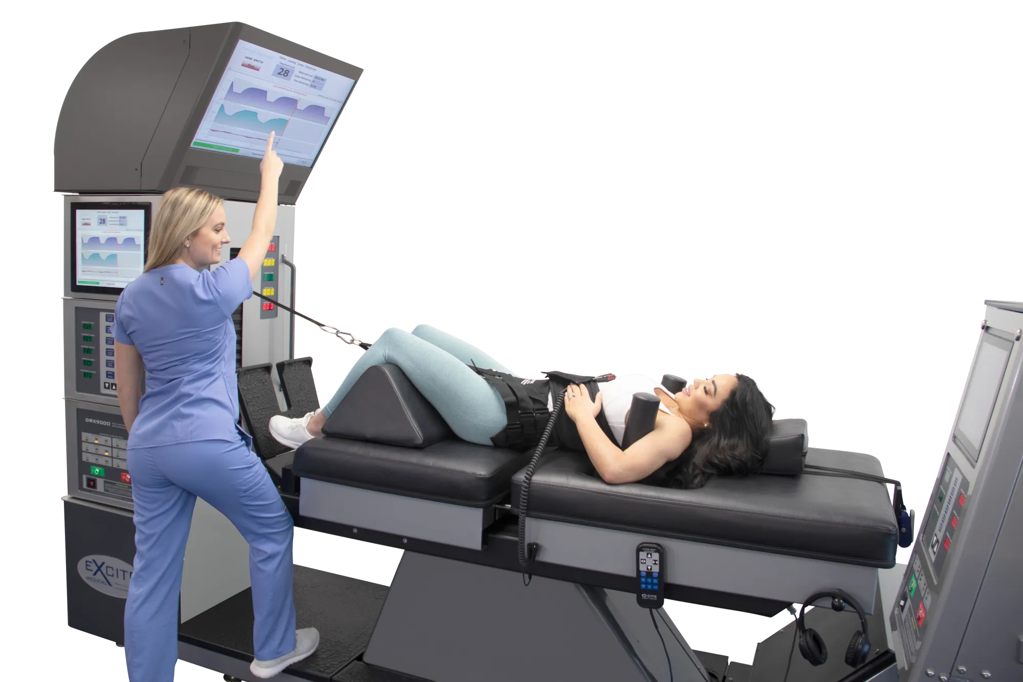 Female chiropractic assistant educating her patient about the DRX 9000 spinal decompression machine screen