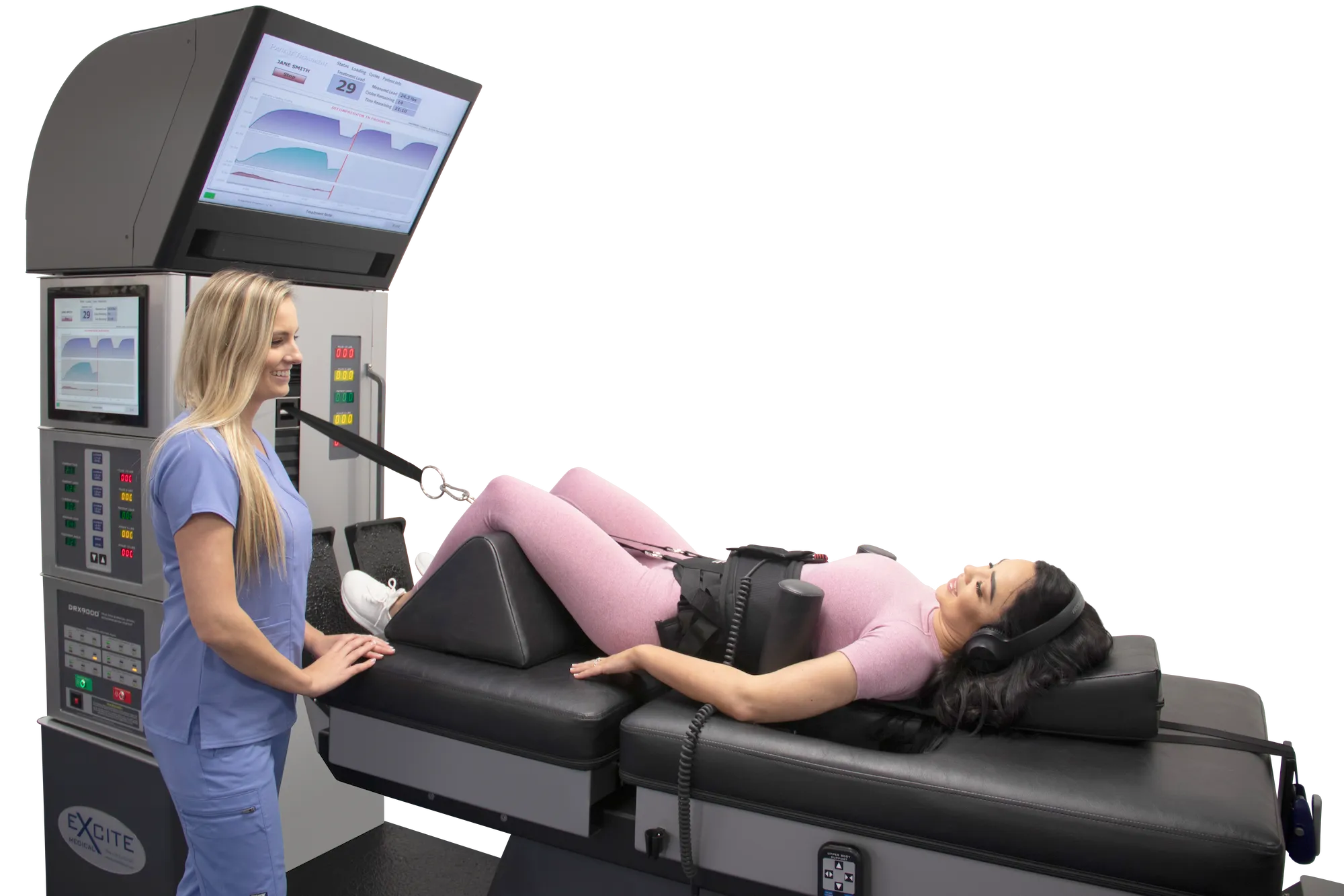 Female chiropractic assistant ensuring her patient is comfortable on the DRX 9000 spinal decompression machine